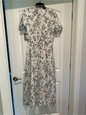 NEW WITH TAGS.  Vince Camuto White Midi Dress with Black Floral Print.    Sz L